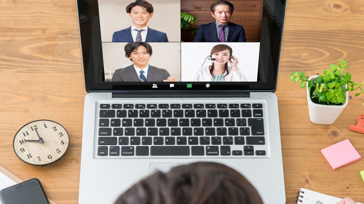 A computer screen of a person participating in an online meeting from home, showing other meeting participants.